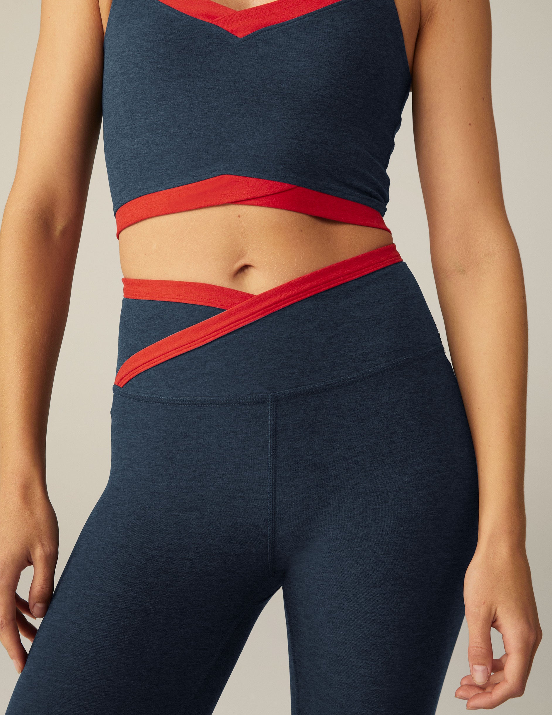 blue and red outline midi legging with criss cross front