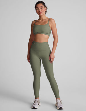 green midi legging with ruching on sides.
