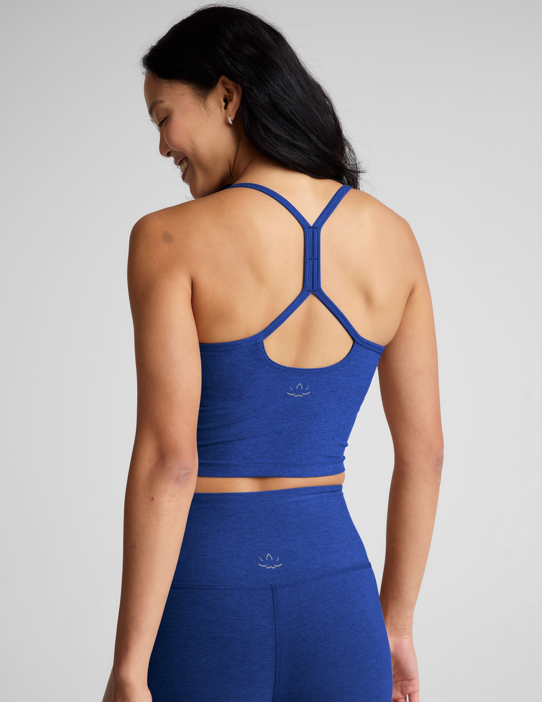 blue cropped tank top with slim spaghetti straps. 