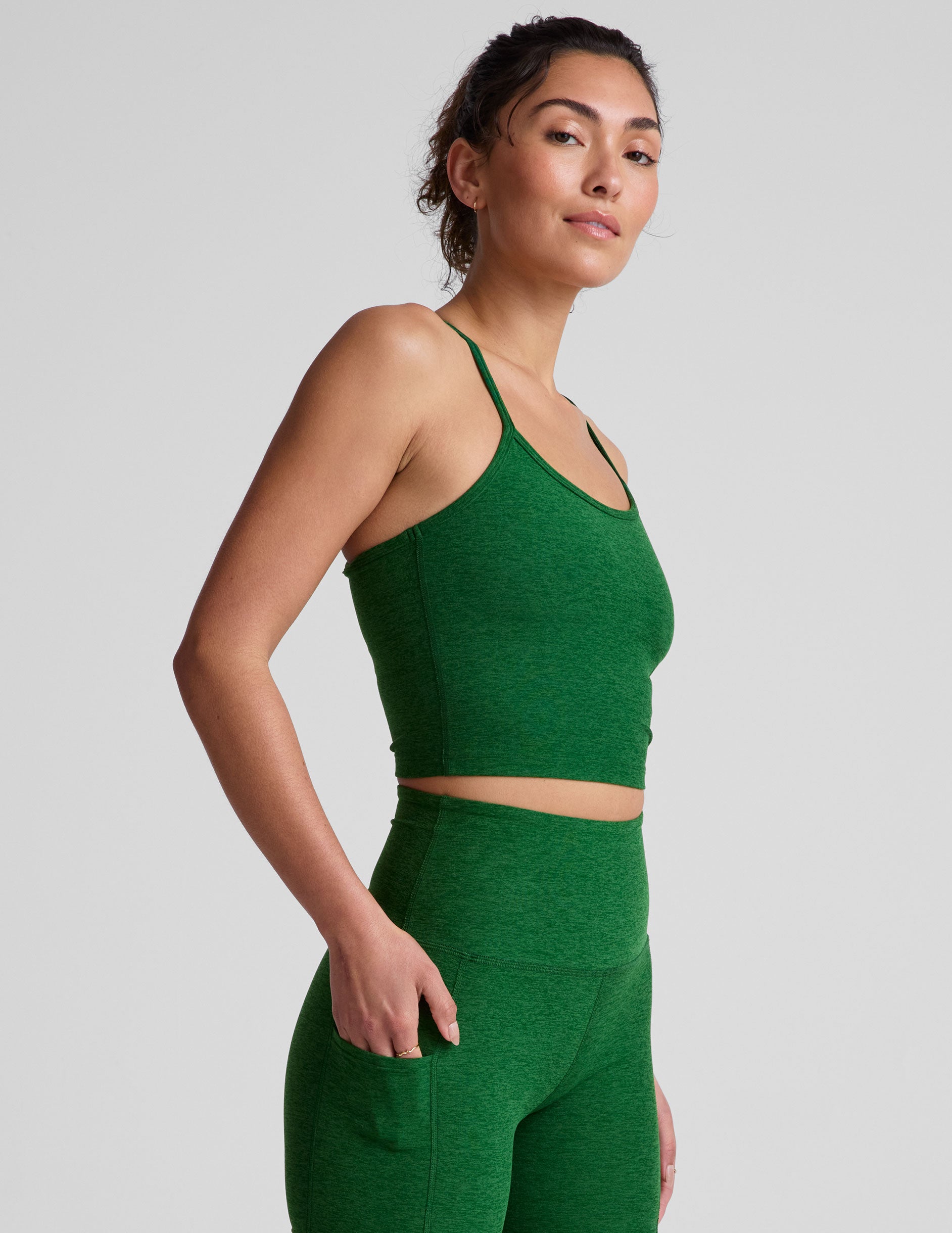 green racerback cropped tank top with slim spaghetti straps. 