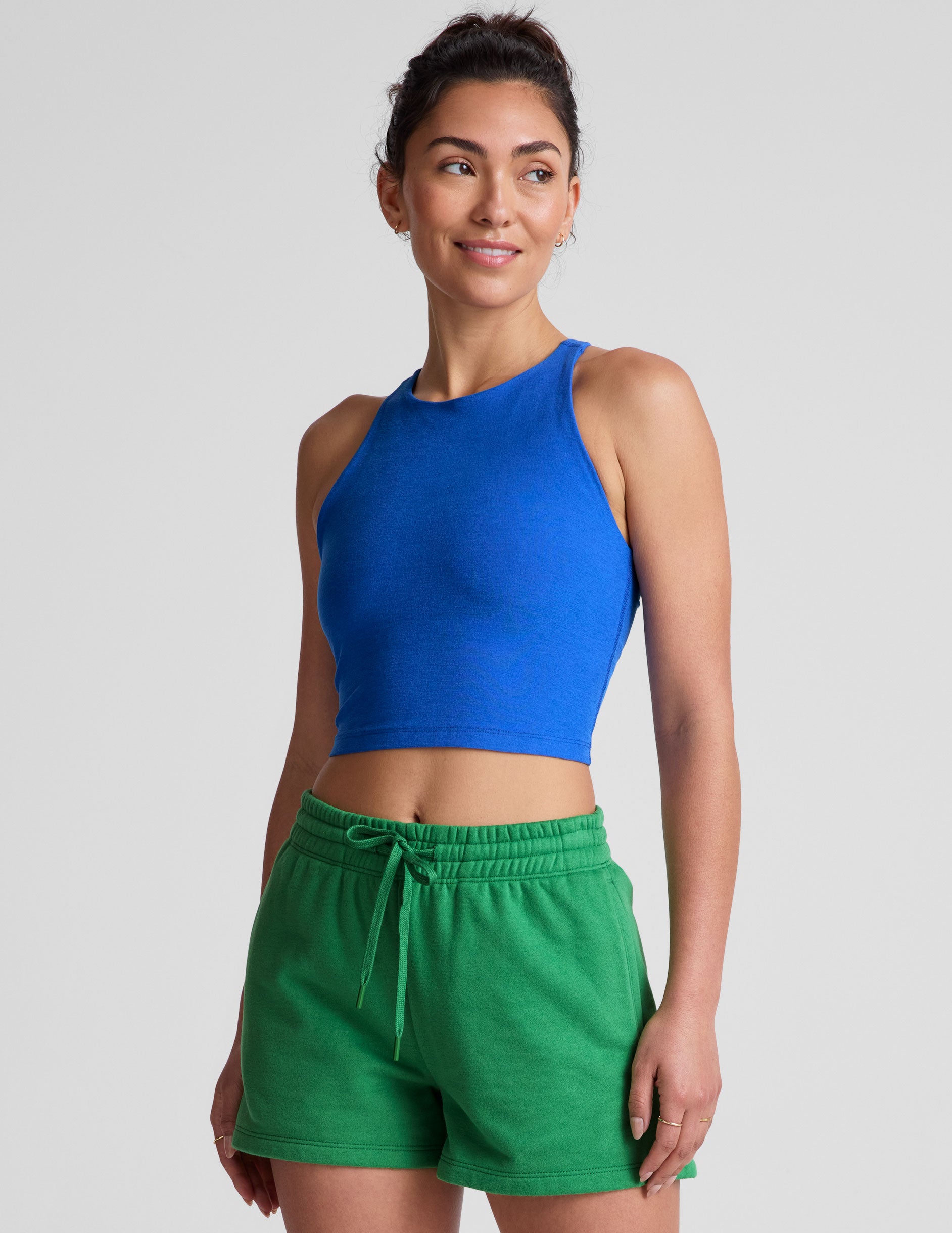 blue high-neck racerback cropped length tank top. 