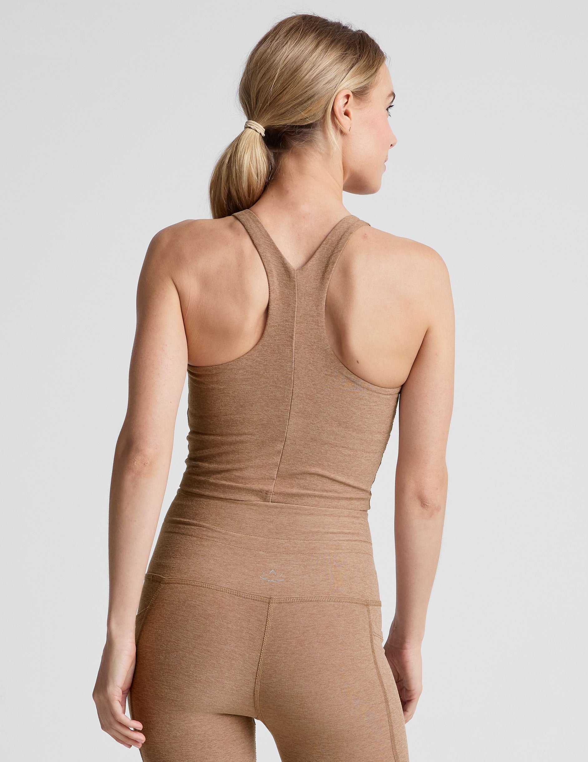 brown high-neck cropped length racerback tank top. 