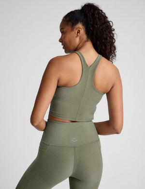 green racerback cropped tank with a high scoop neckline. 