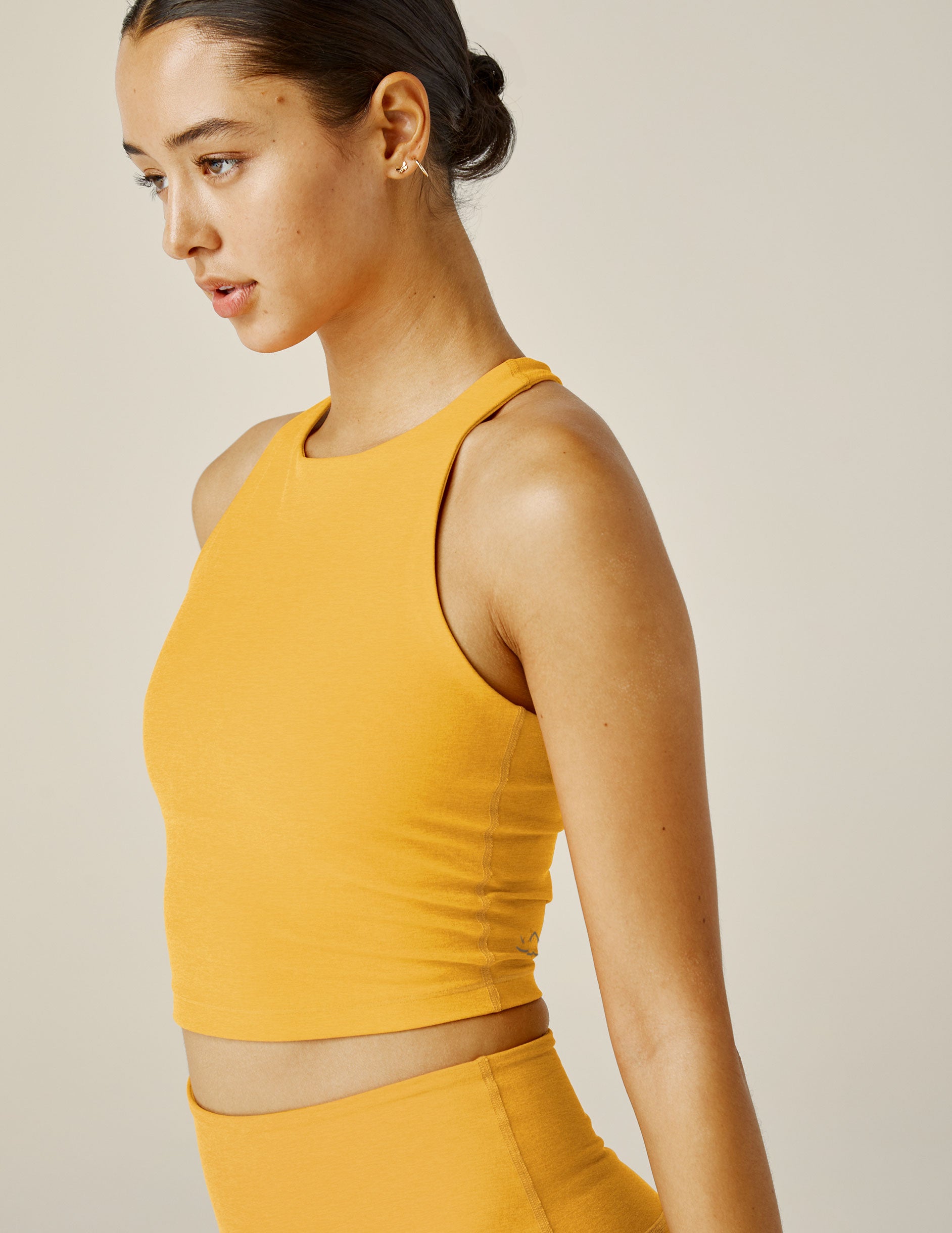 yellow high-neck racerback cropped tank top. 