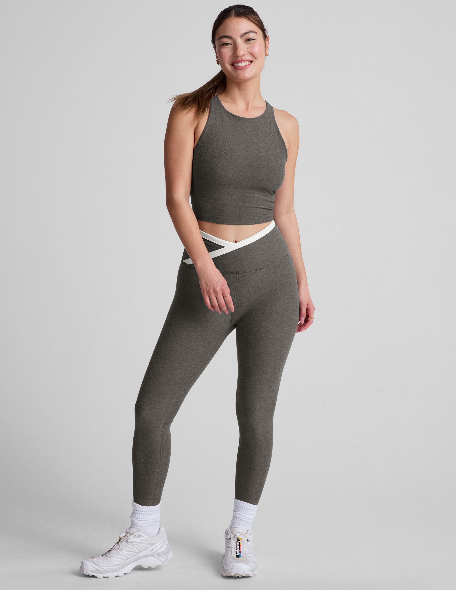 gray cropped tank top with a high scoop neckline. 