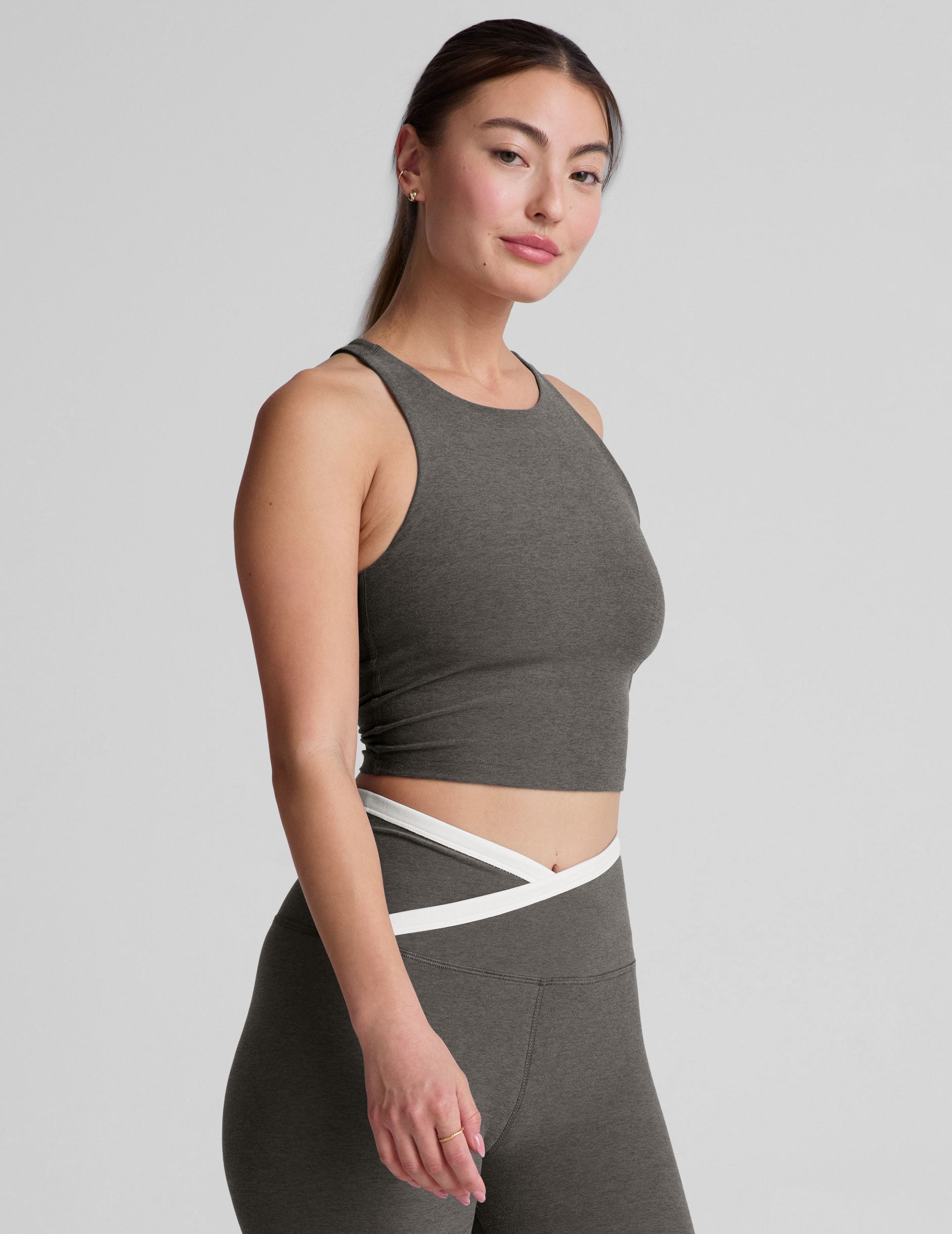 gray cropped tank top with a high scoop neckline. 