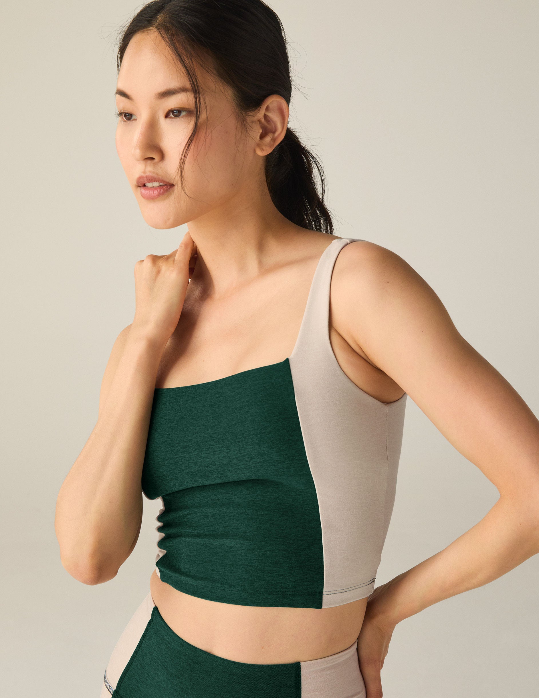 green square necked cropped tank top with eggshell outlines. 