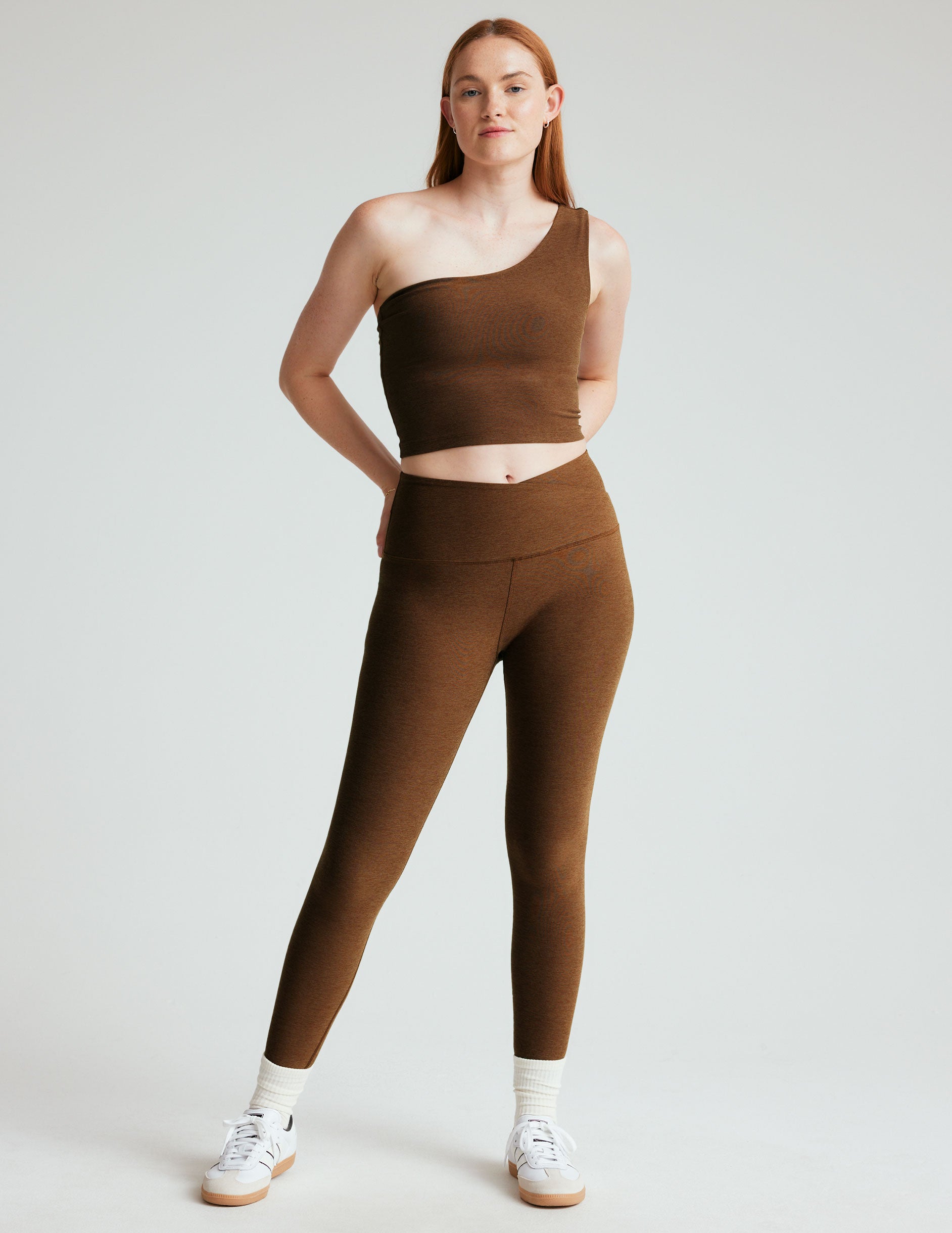 brown one shoulder spacedye cropped tank with a cutout detail on the back strap.