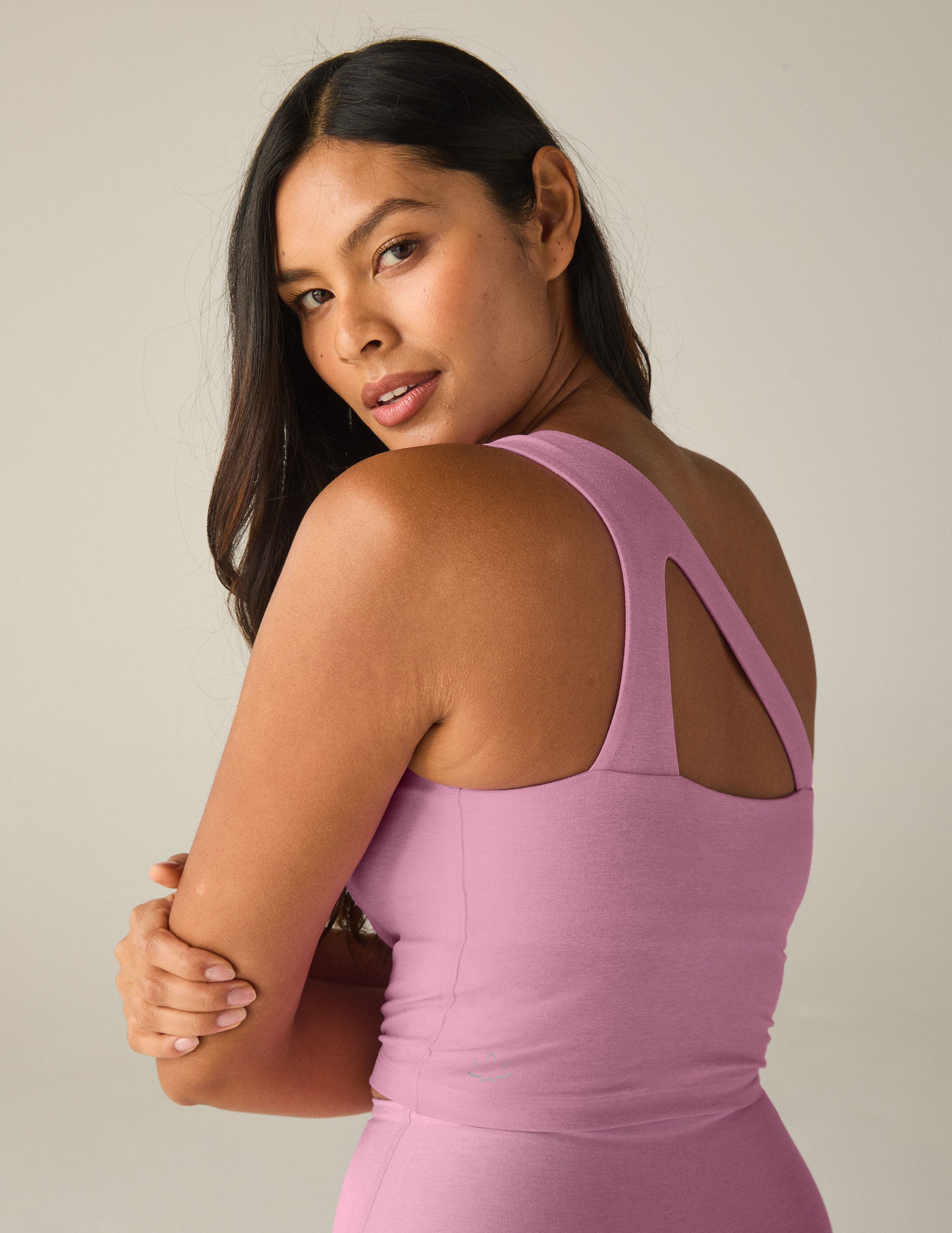 pink one-shoulder cropped tank top. 