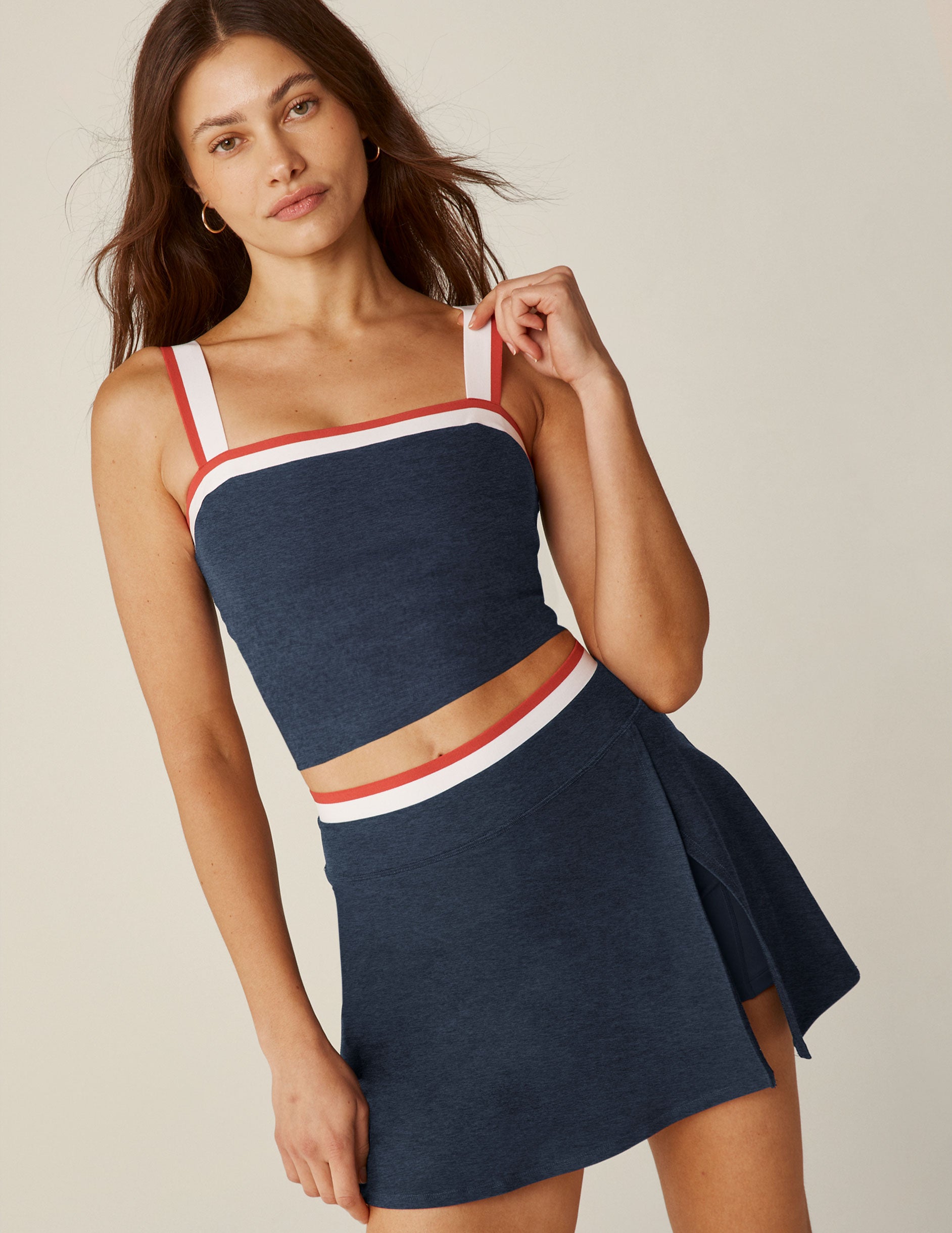 blue square neck cropped tank top with white and red stripes and outlining around the neckline. 