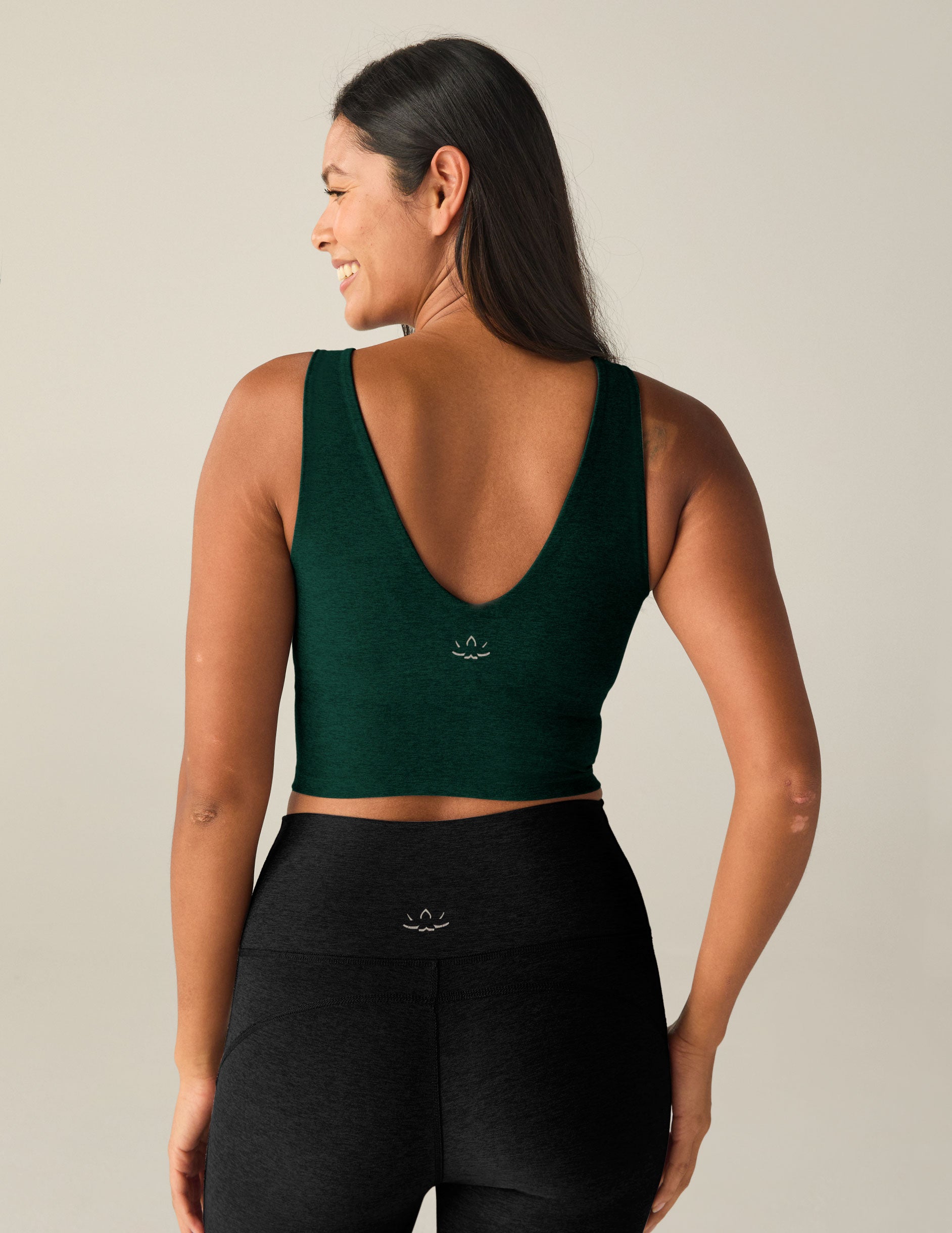 dark green v-neck cropped tank. 