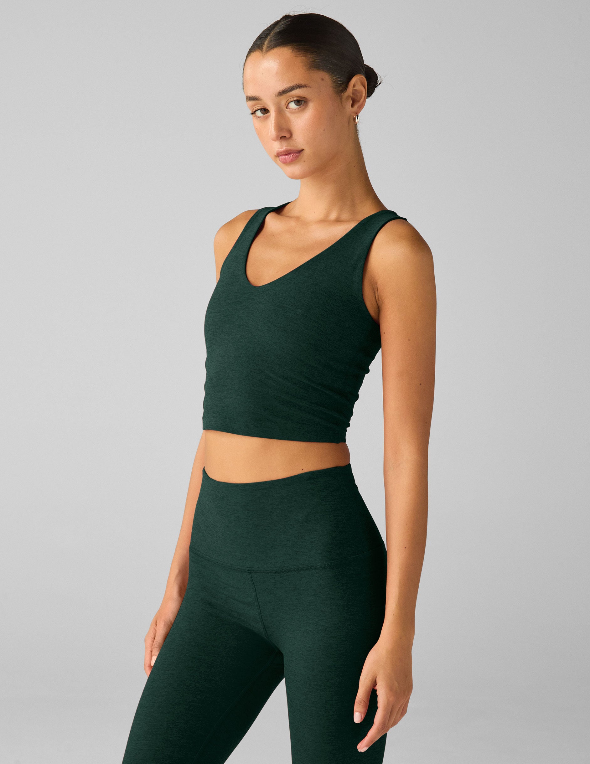 dark green v-neck cropped tank. 