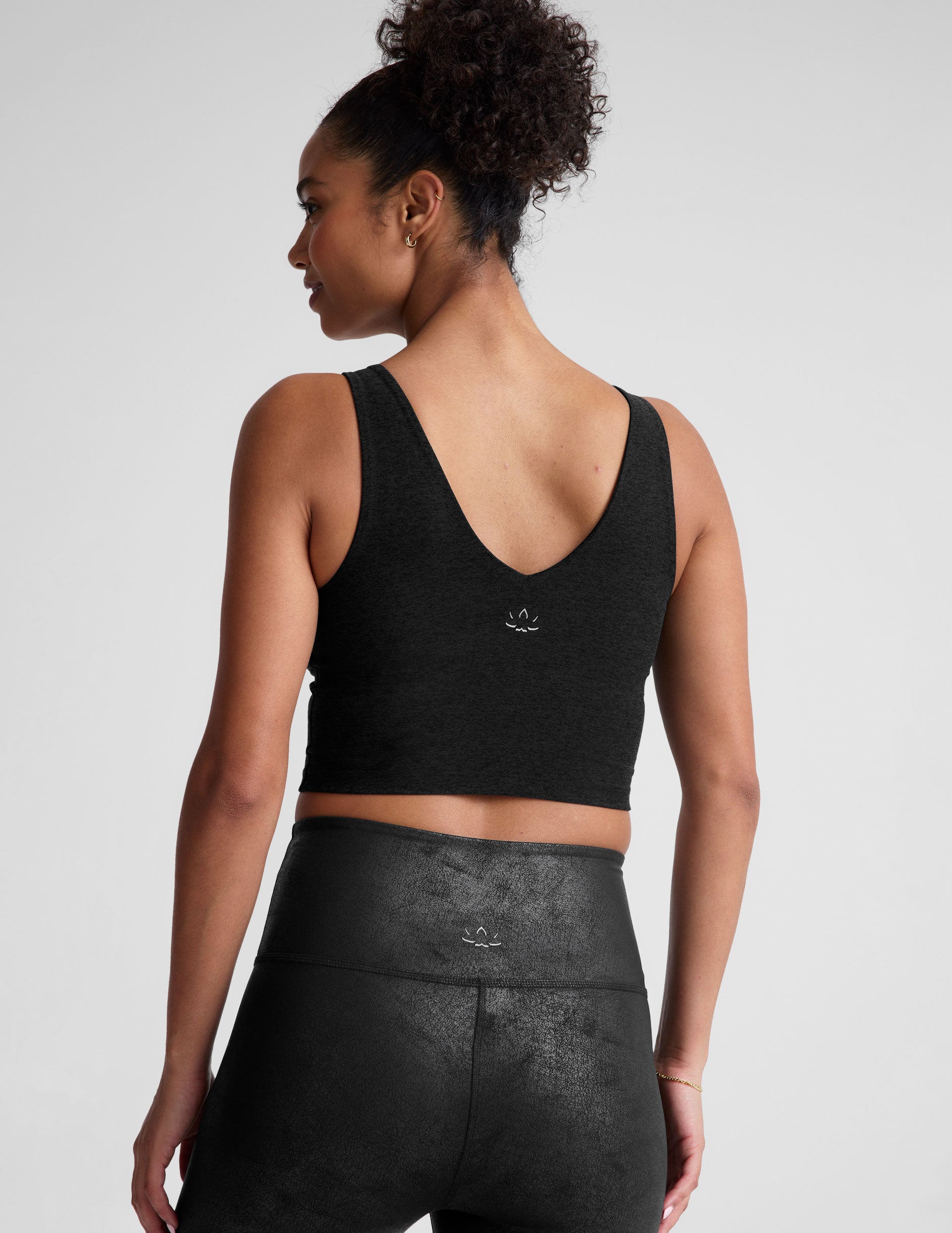 black v-neck cropped tank top. 