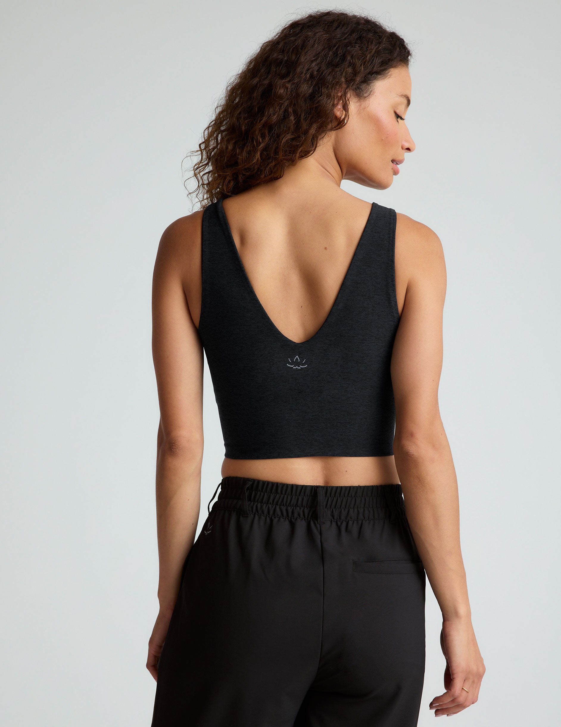 black v-neck cropped tank top. 