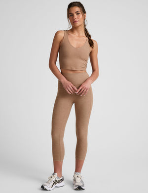 tan cropped tank top with a front and back v neckline. 