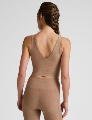 tan cropped tank top with a front and back v neckline. 