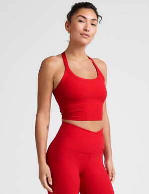 red v-neck cropped tank top with a high racerback. 
