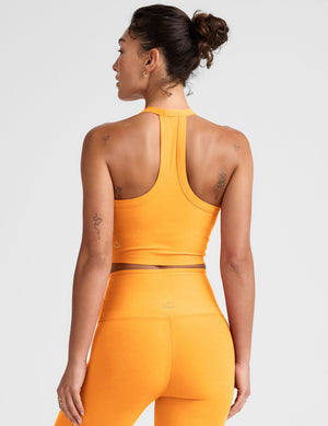 orange v-neck cropped tank with a high racerback. 