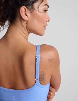 blue waist length tank top with slim adjustable straps. 
