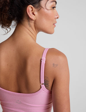 pink waist length tank with adjustable spaghetti straps. 