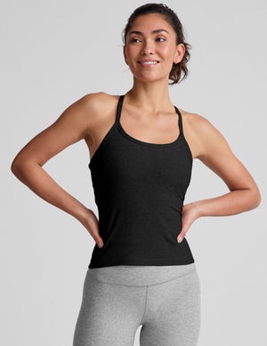 black midway length tank with adjustable spaghetti straps. 