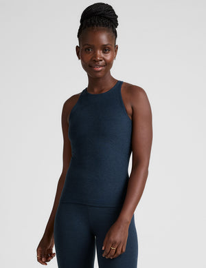 blue long length tank with a high scoop neckline. 