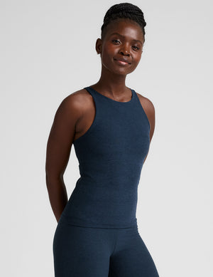 blue long length tank with a high scoop neckline. 