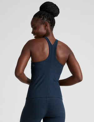 blue long length tank with a high scoop neckline. 
