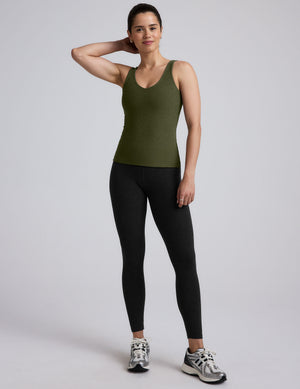 green long length tank top with a front and back v neckline. 