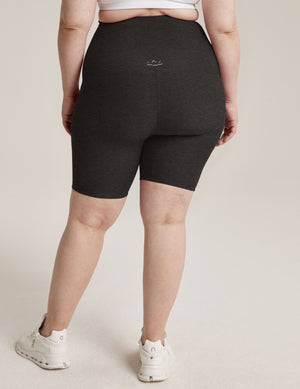 Back view of the high-waisted Spacedye Cruiser Maternity Biker Short in marled Darkest Night charcoal grey.