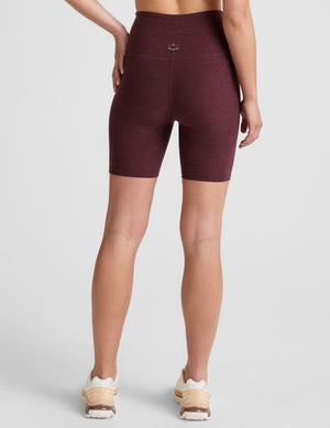 model is wearing red high-waisted 7