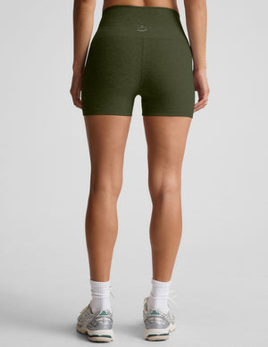 model is wearing green high-waisted 3