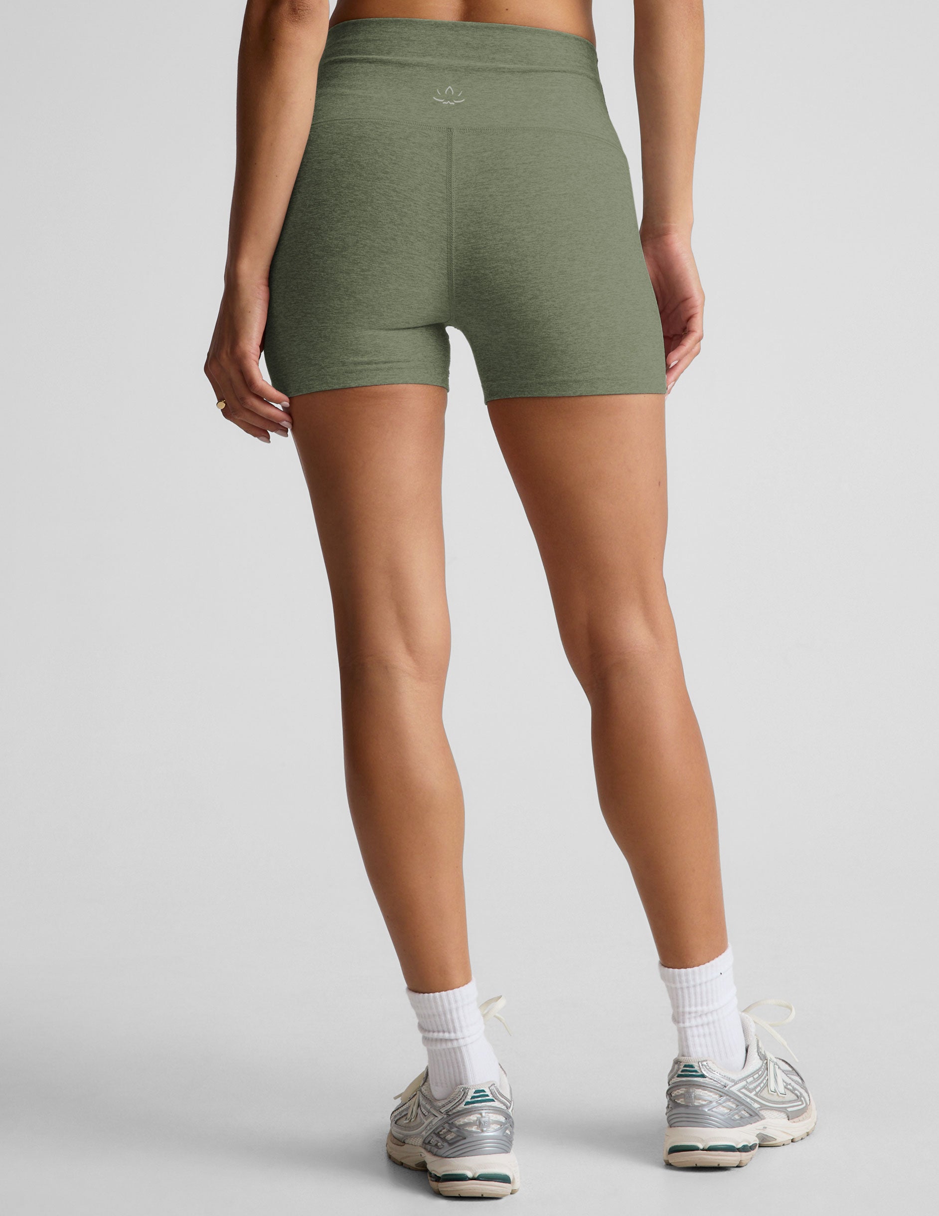 green high-waisted 3" inseam biker shorts. 