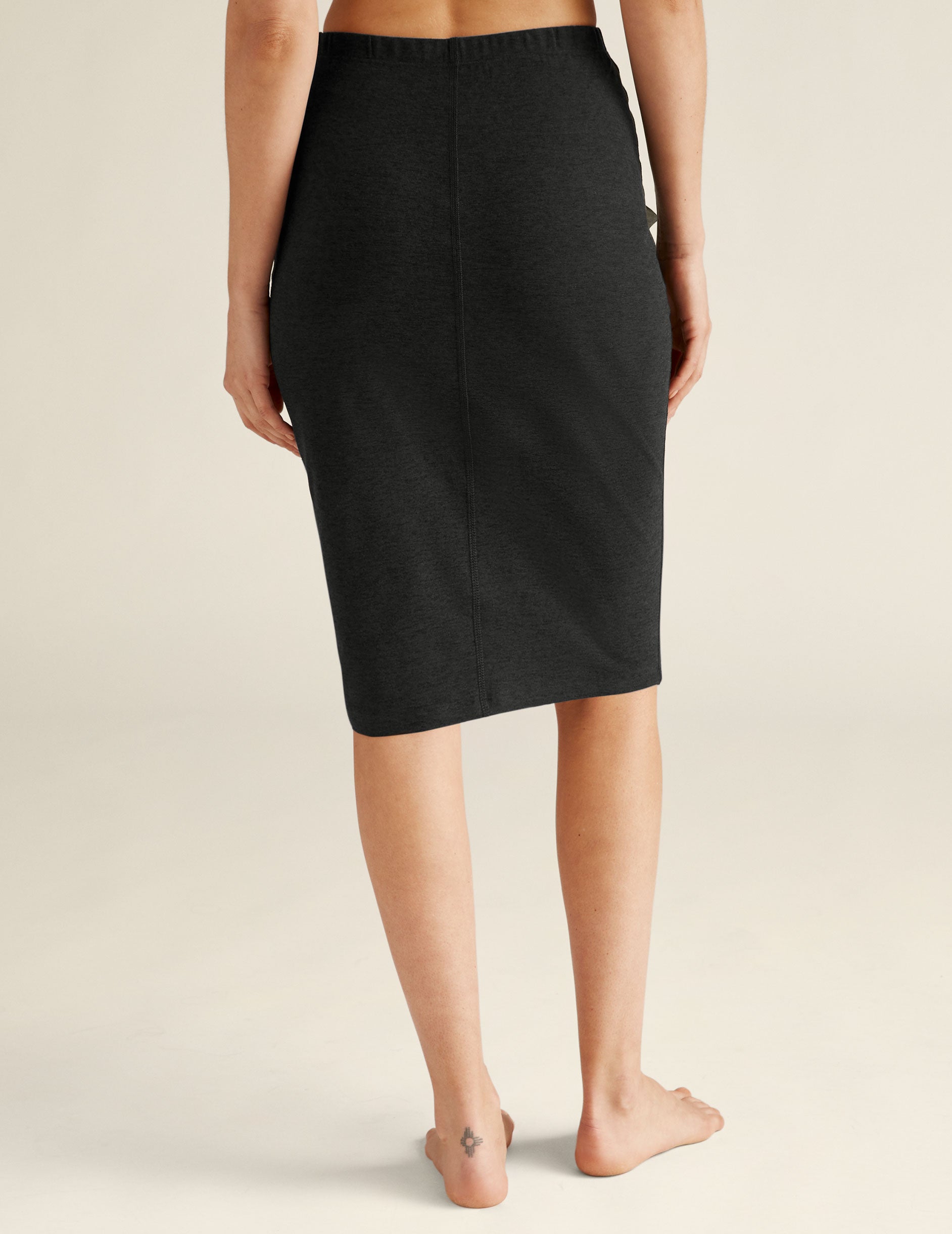 black midi length skirt. 