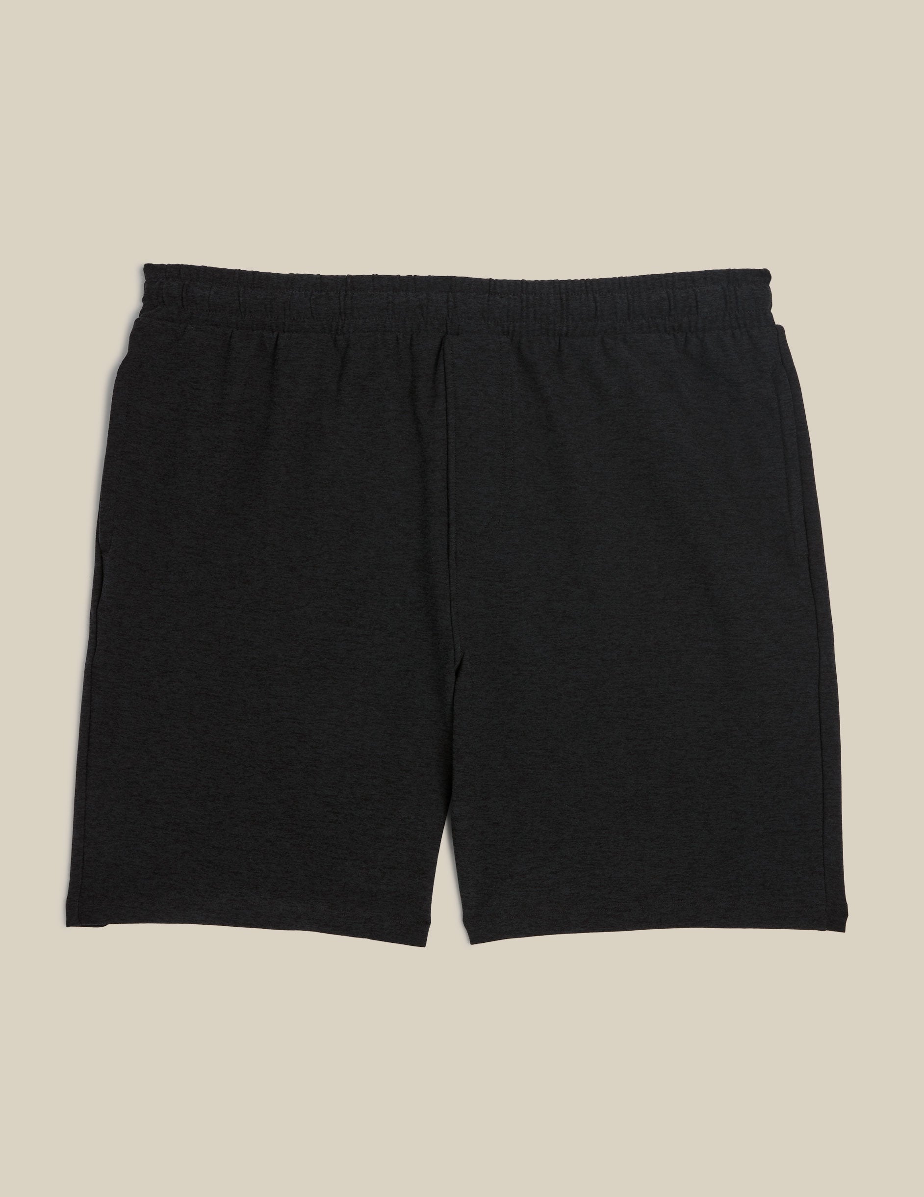 black relaxed fit men's athleisure shorts with pockets.