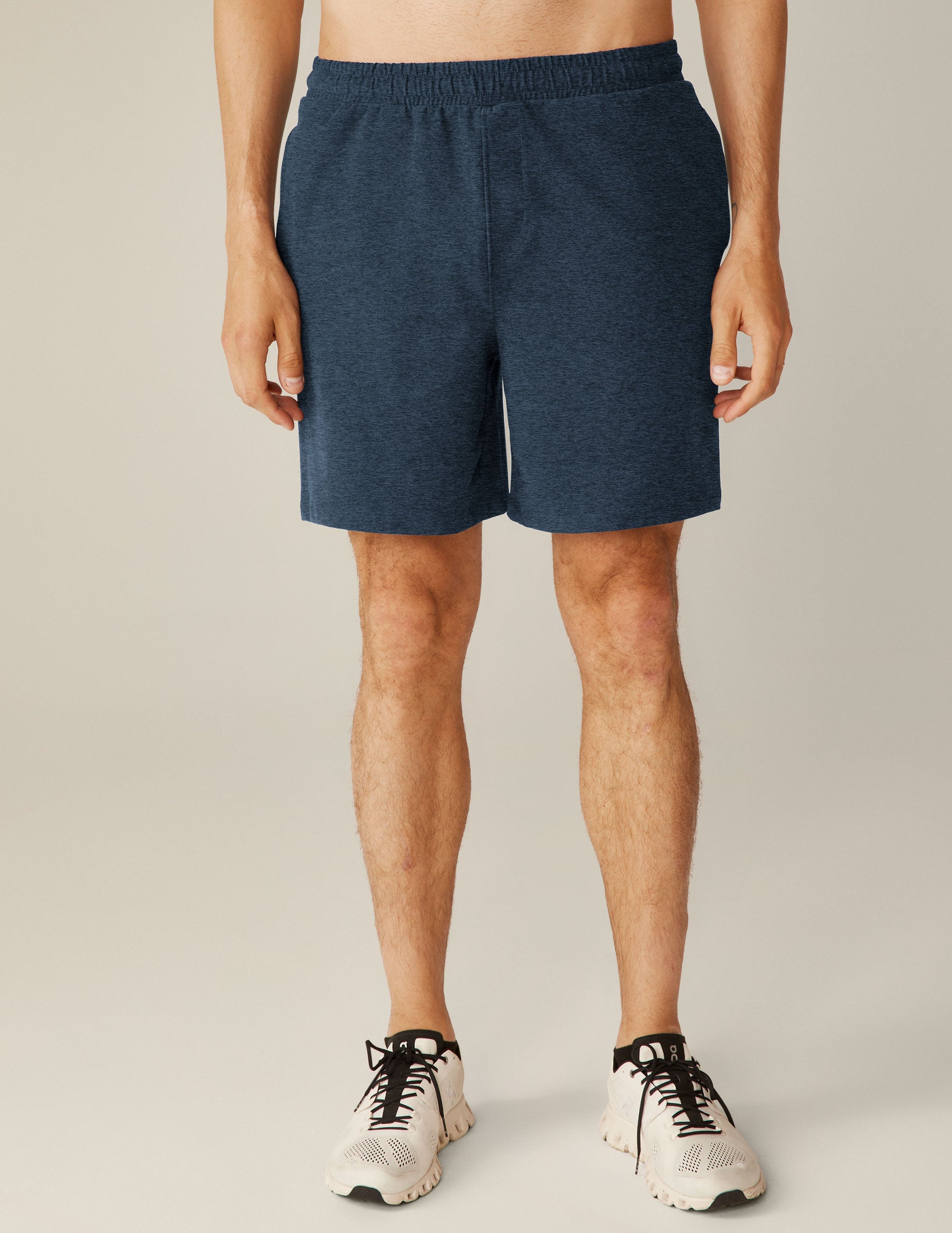 blue relaxed fit men's athleisure shorts with pockets. 