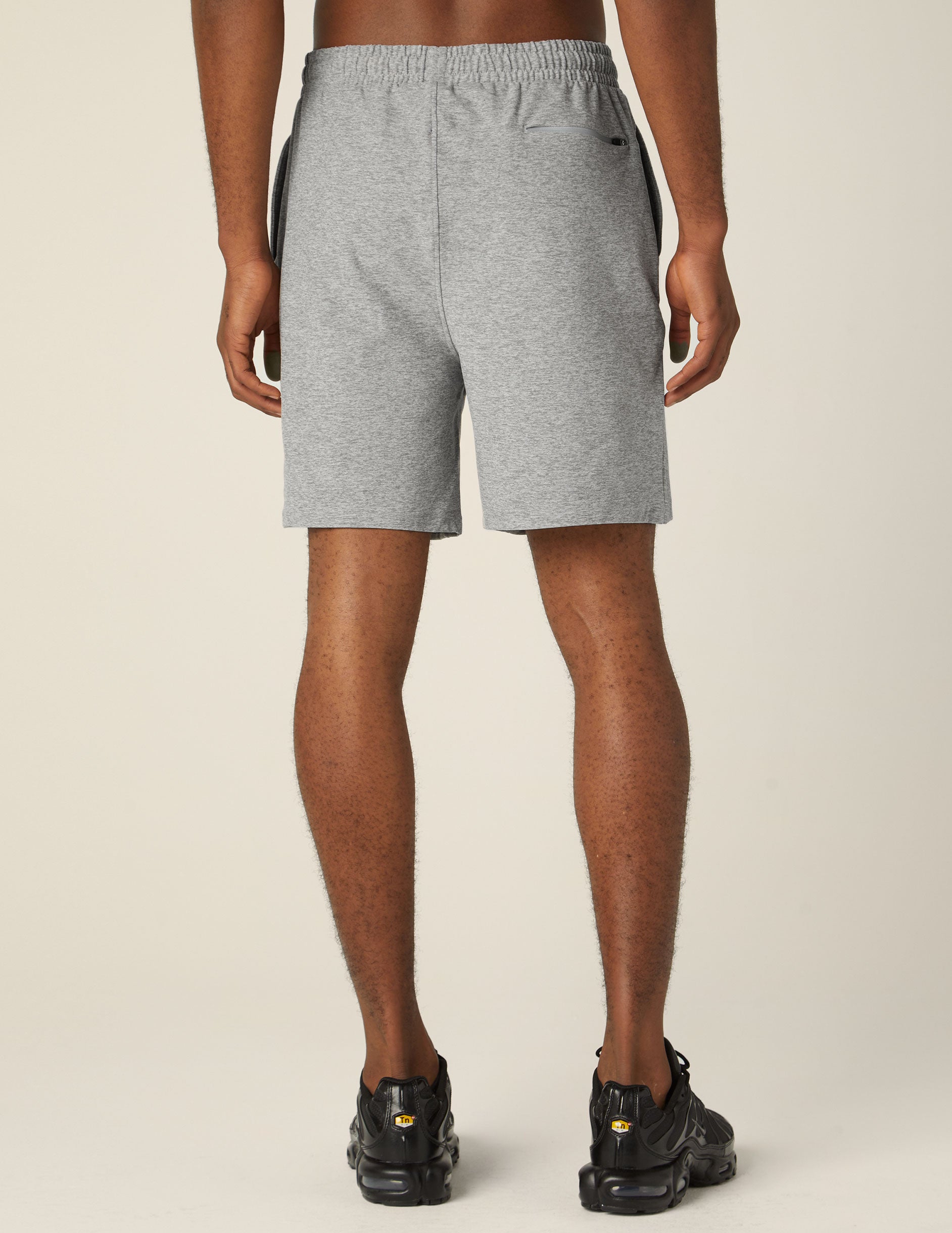 gray men's relaxed fit athleisure shorts with pockets. 