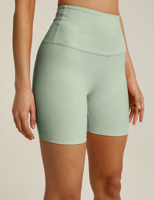 green high-waisted biker shorts with a 5