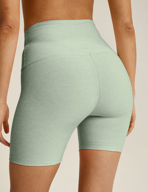 green high-waisted biker shorts with a 5