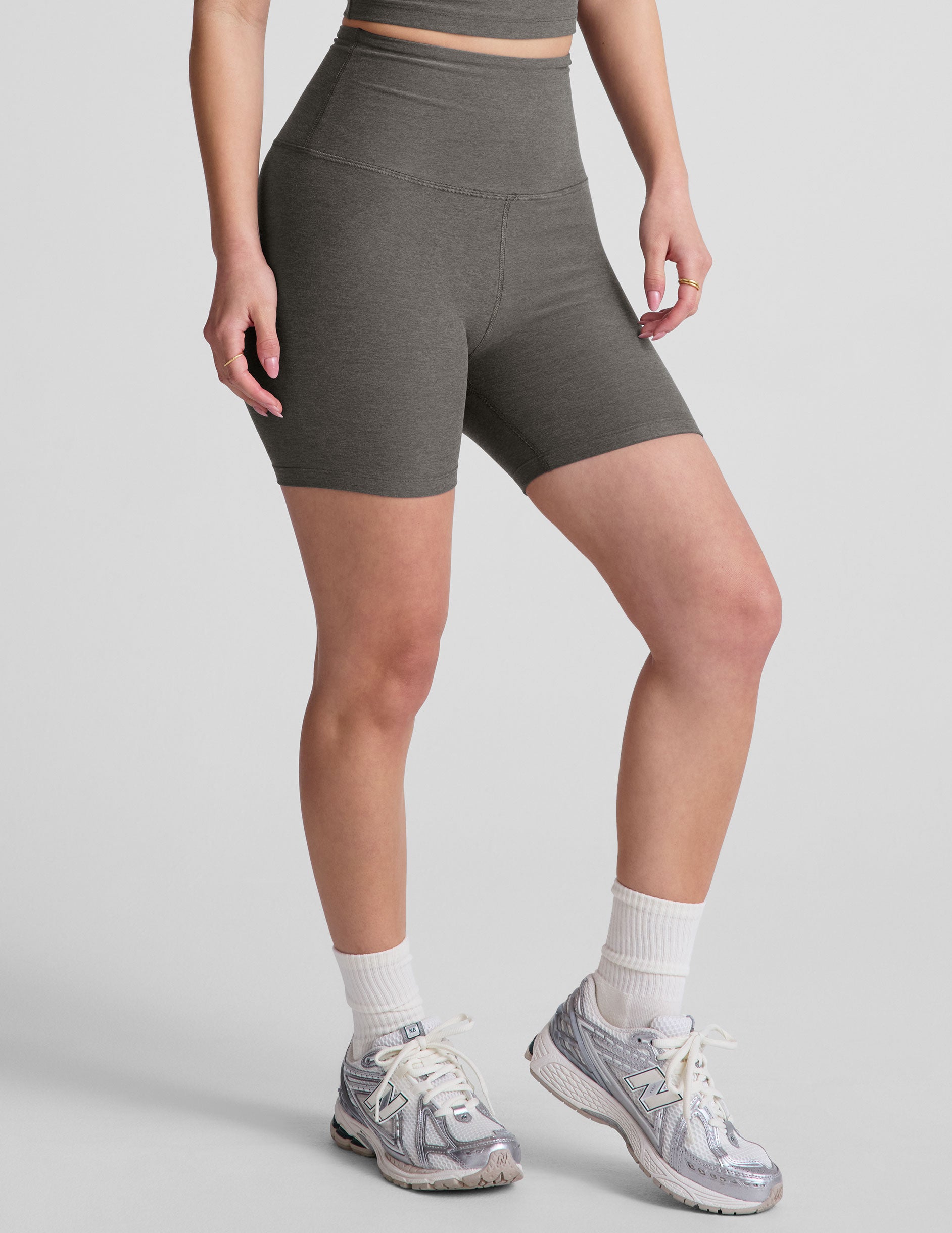 gray high-waisted biker shorts with a 5" inseam. 