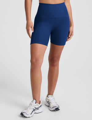 Woman wearing blue high-waisted 5