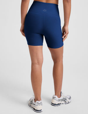 Woman wearing blue high-waisted 5