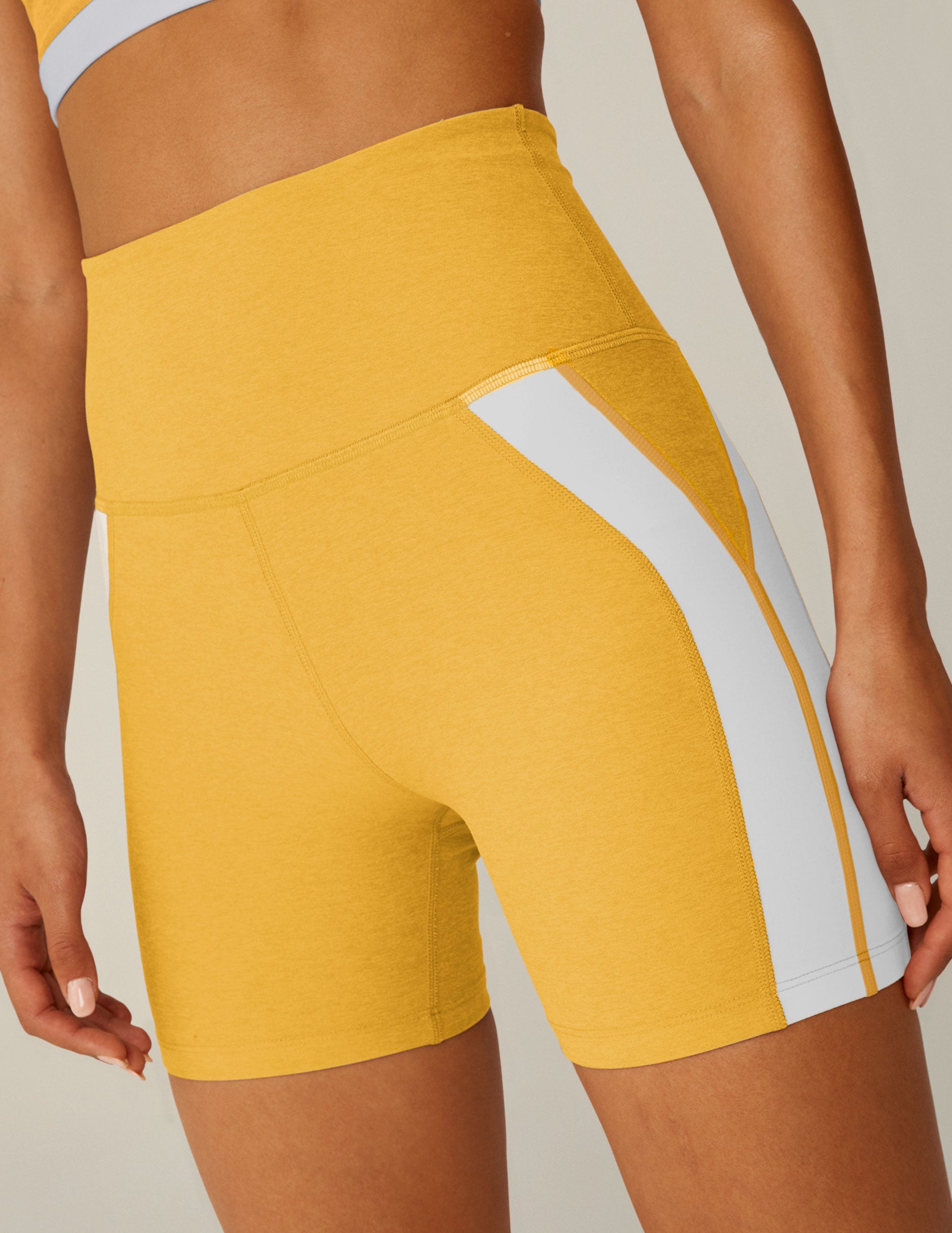 Orders yellow biker shorts