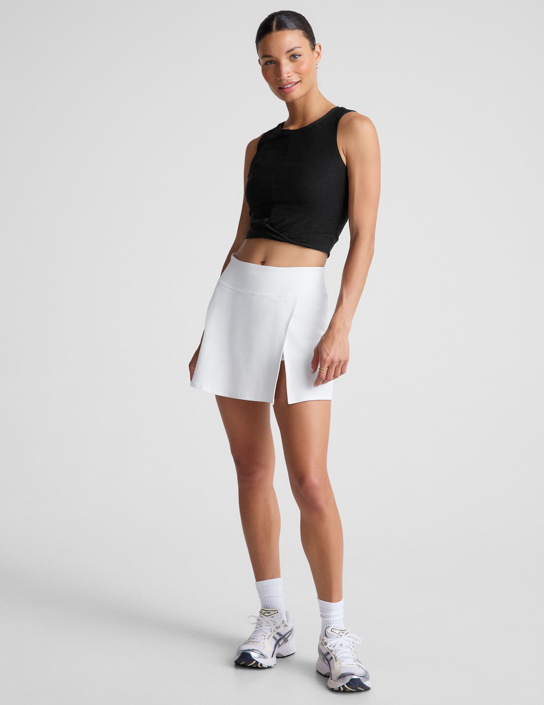 white skirt with slit and shorts underneath