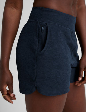 blue mid-rise spacedye shorts with pockets. 