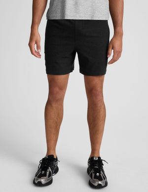 black men's spacedye shorts against a plain background. 