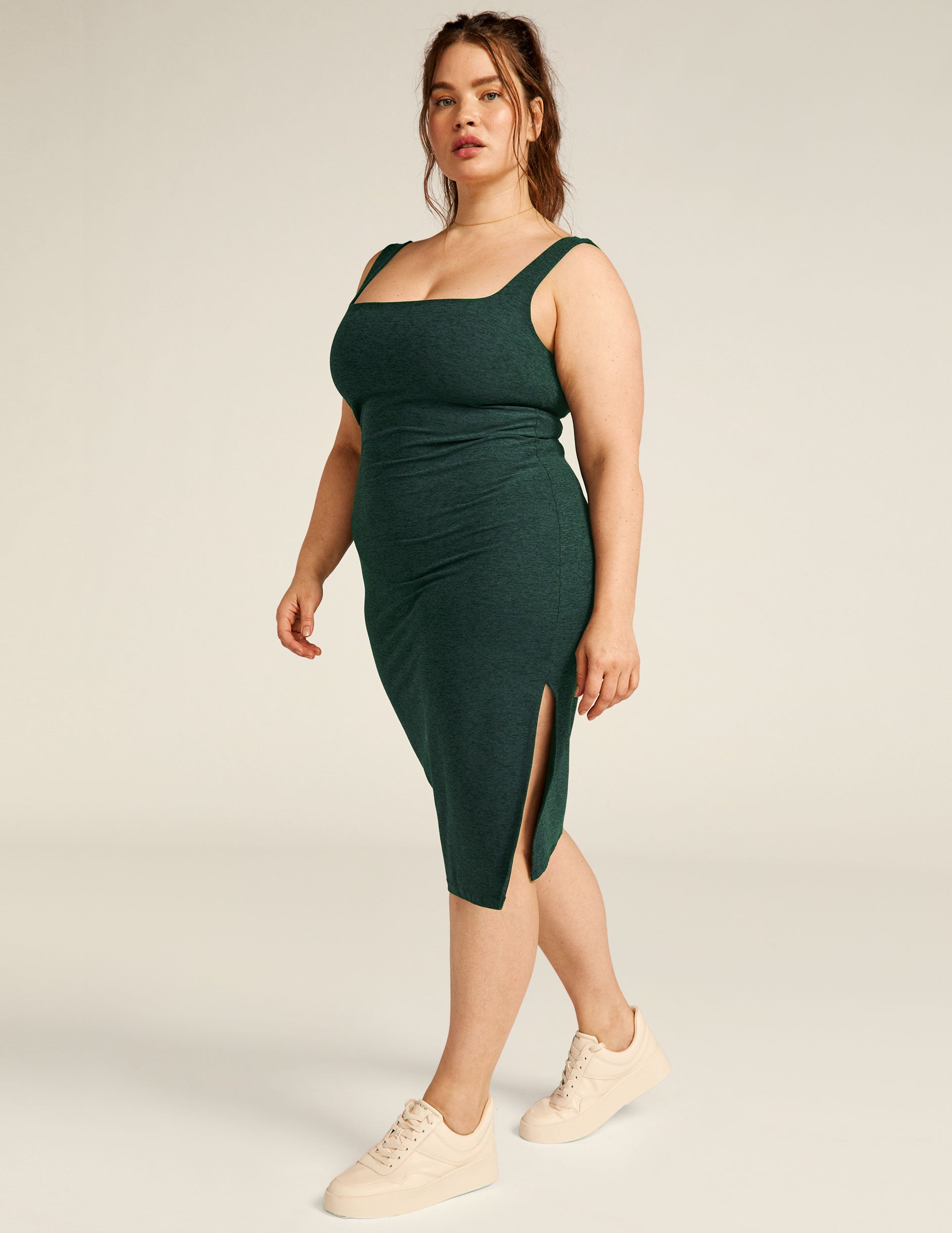 green tank top midi dress with a front side slit. 