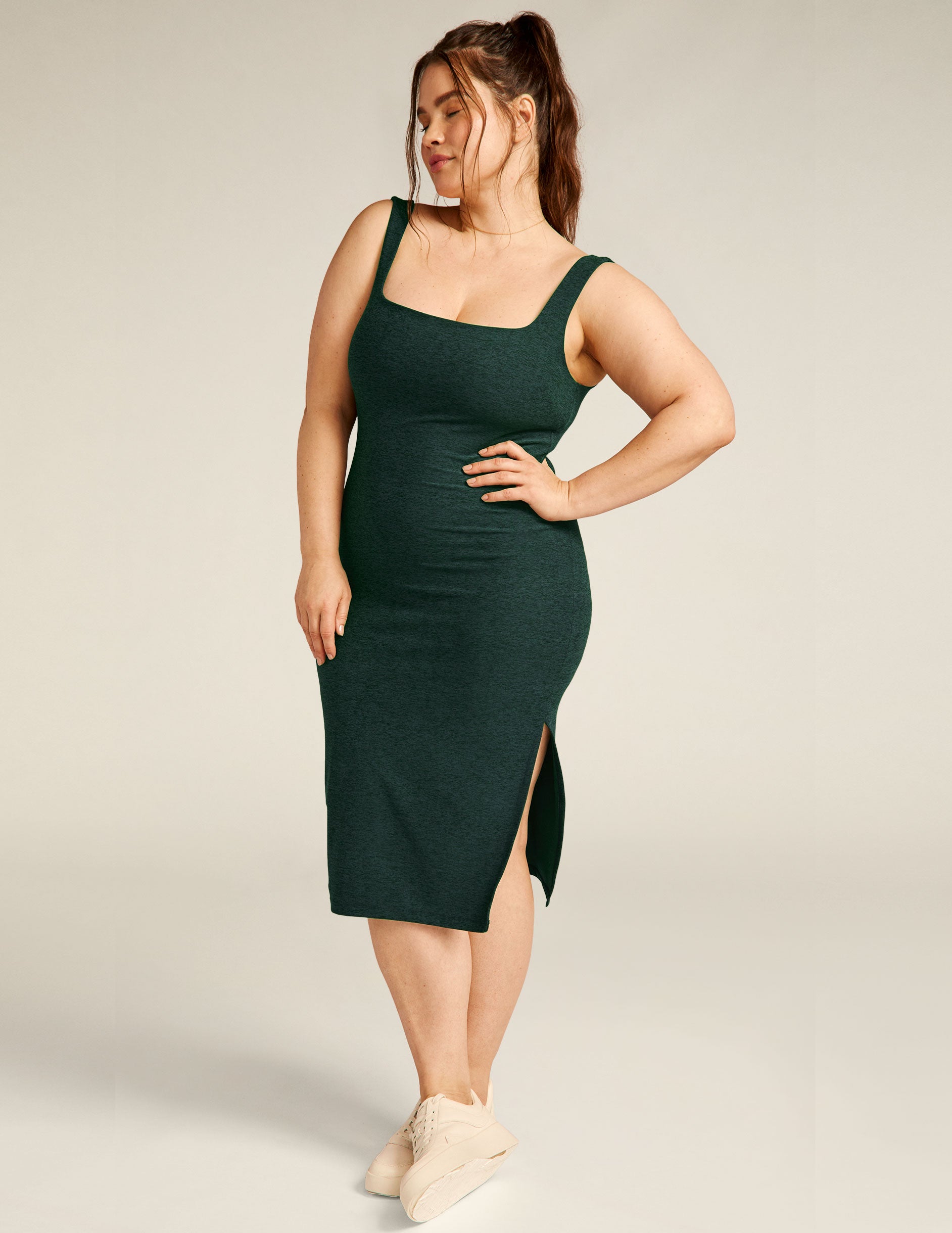 green tank top midi dress with a front side slit. 