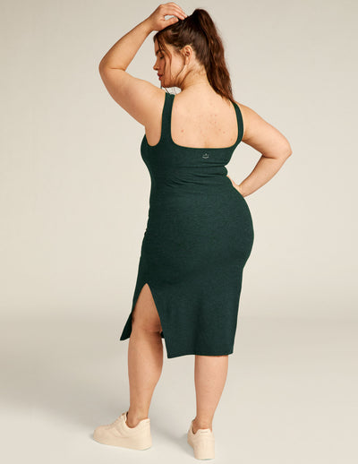 green tank top midi dress with a front side slit. 