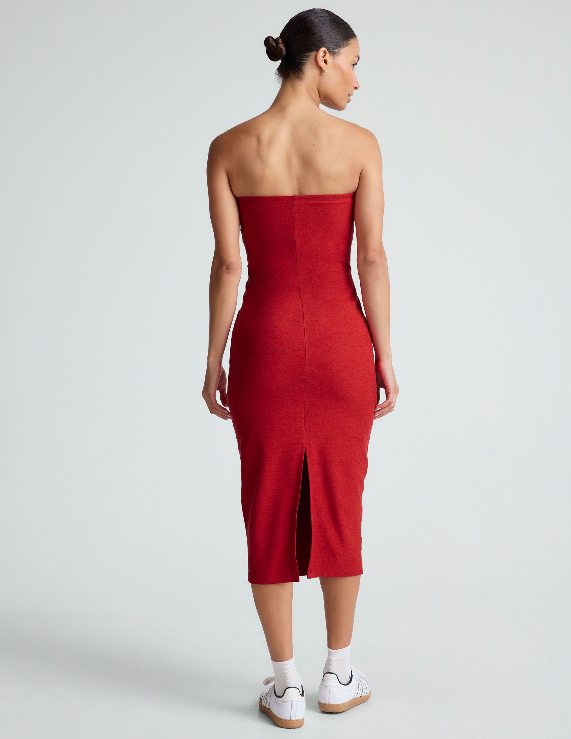 red strapless midi dress with a back slit. 